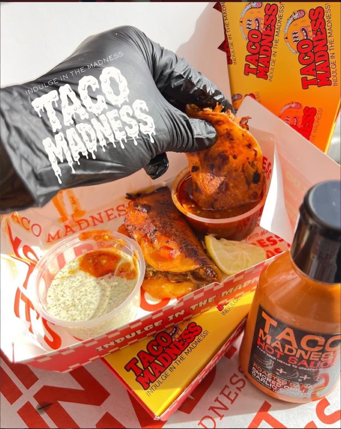 Loaded birria tacos with house hot sauce